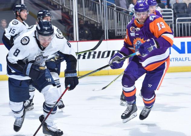 Jacksonville Icemen defenseman Zach Berzolla (left) vs. the Orlando Solar Bears