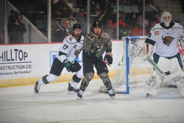 Forward Nick Devito with the Adirondack Thunder (center)