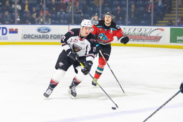 Vancouver Giants left wing Adam Hall (left) vs. the Kelowna Rockets