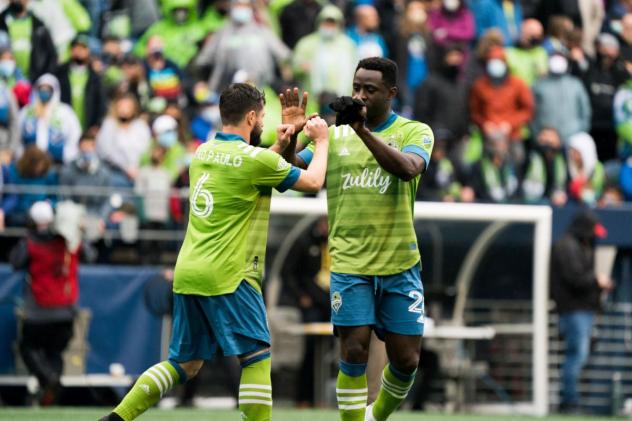 João Paulo and Yeimar of Seattle Sounders FC