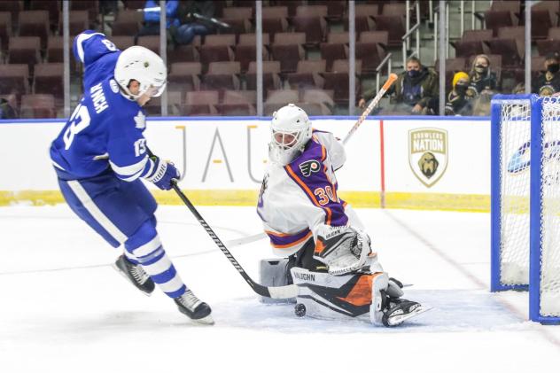 Reading Royals goaltender Pat Nagle stuffs a shot from the Newfoundland Growlers