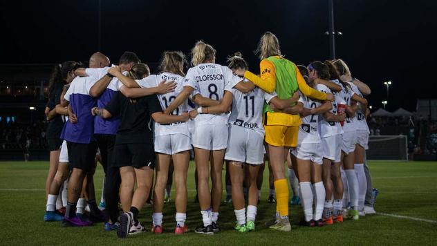Racing Louisville FC huddle