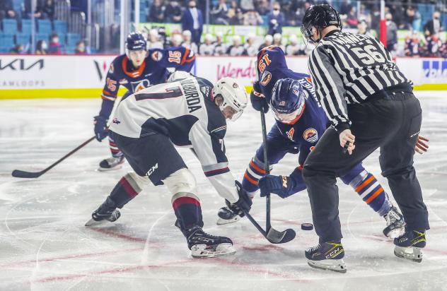 Ty Halaburda of the Vancouver Giants faces off against the Kamloops Blazers