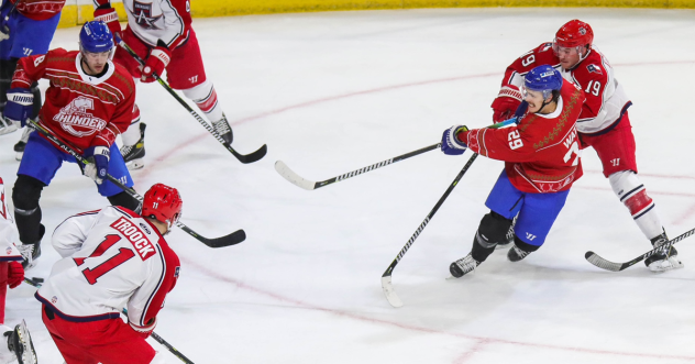 Wichita Thunder forward Brayden Watts pushes the puck against the Allen Americans