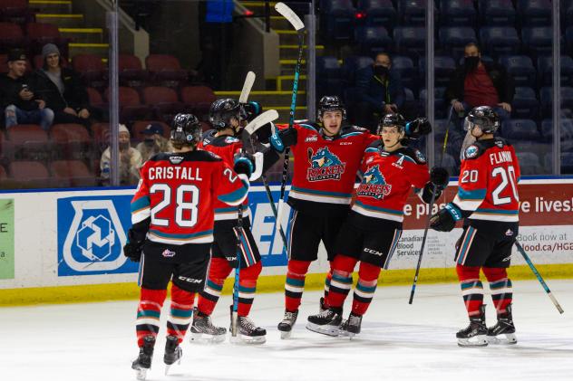 Kelowna Rockets gather after a goal