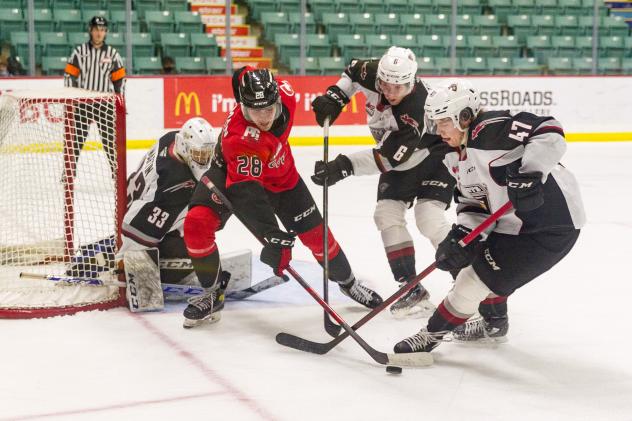 Vancouver Giants defenders and goaltender Connor Martin vs. the Prince George Cougars