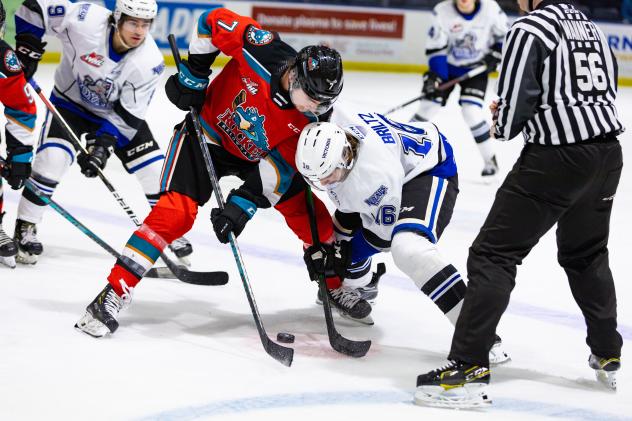 Kelowna Rockets centre Max Graham (left) vs. the Victoria Royals
