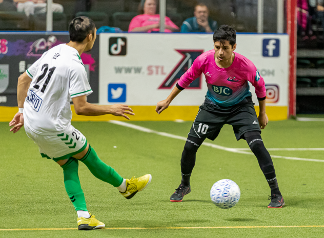 St. Louis Ambush midfielder Lucas Ameida (right) vs. the Dallas Sidekicks