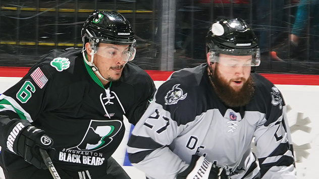 Binghamton Black Bears forward Gavin Abbott (left) vs. the Delaware Thunder