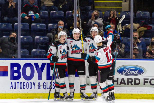 Kelowna Rockets gather following a goal