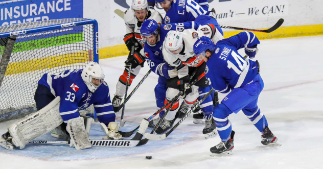 Wichita Thunder goaltender Jake Theut eyes the puck against the Kansas City Mavericks