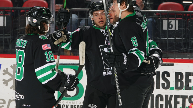 Binghamton Black Bears react after a goal against the Port Huron Prowlers