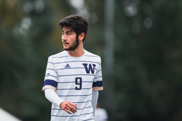 University of Washington midfielder Dylan Teves