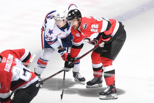 Belleville Senators right wing Logan Shaw faces off against the Rochester Americans