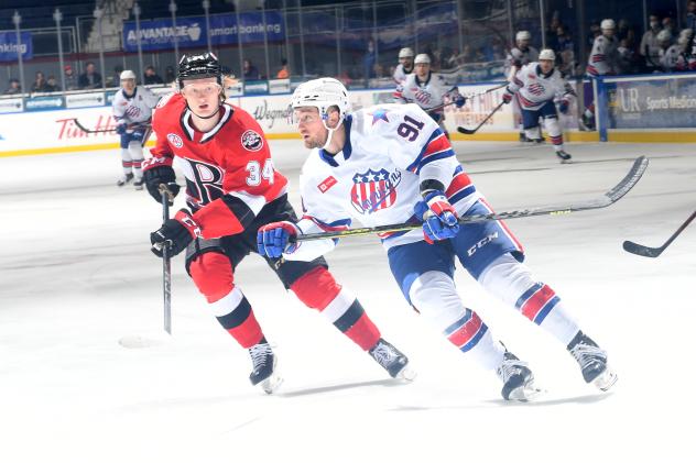 Belleville Senators left wing Roby Jarventie (left) vs. the Rochester Americans