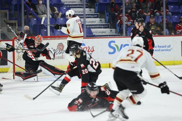 Prince George Cougars goaltender Tyler Brennan scrambles to make a save against the Vancouver Giants