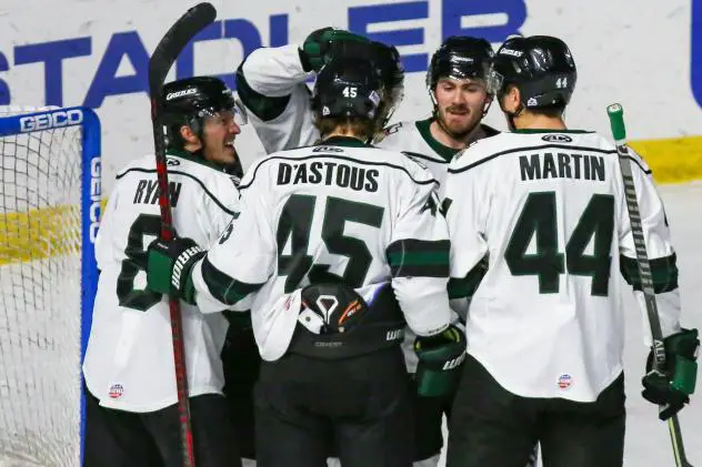 Utah Grizzlies gather after a goal against the Allen Americans