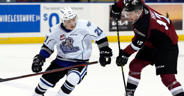 Victoria Royals right wing Anthony Wilson (left) vs the Vancouver Giants