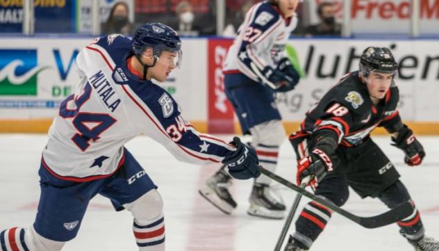 Tri-City Americans forward Sasha Mutala (left) vs. the Portland Winterhawks