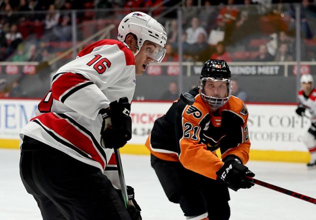 Lehigh Valley Phantoms right wing Linus Sandin (right) vs. the Charlotte Checkers