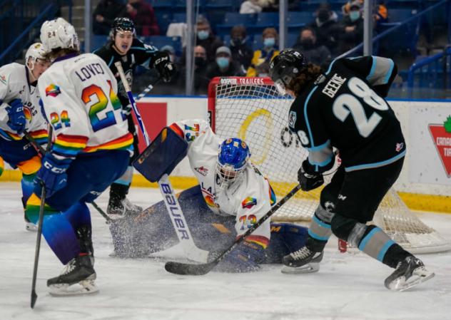 Winnipeg ICE centreman Conor Geekie (right) vs. the Saskatoon Blades
