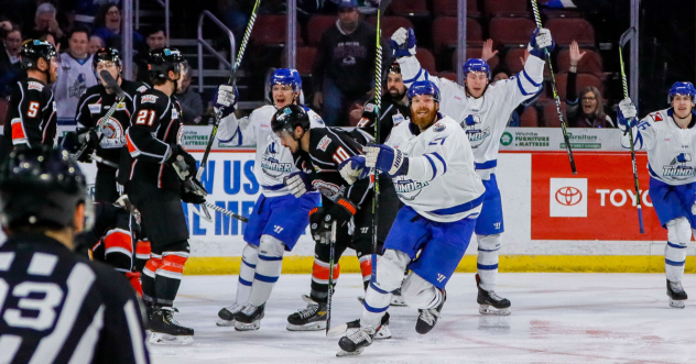 Wichita Thunder celebrate after a score against the Kansas City Mavericks