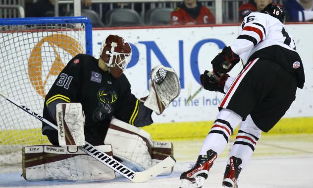 Iowa Heartlanders goaltender Corbin Kaczperski makes a save