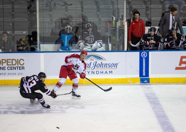 Gavin Gould of the Allen Americans (right) vs. the Rapid City Rush