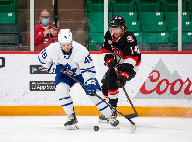 Belleville Senators forward Rourke Chartier (right) vs. the Toronto Marlies