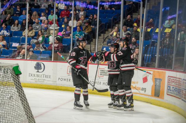 Rapid City Rush celebrate a goal against the Tulsa Oilers