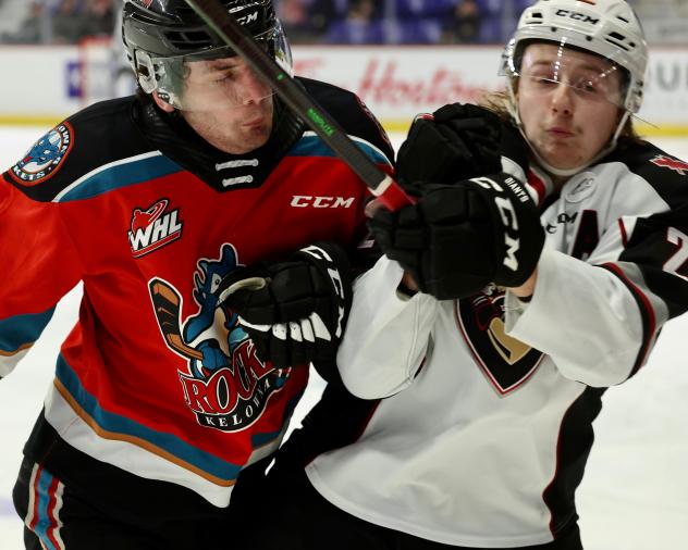 Vancouver Giants defenseman Connor Horning (right) vs. the Kelowna Rockets