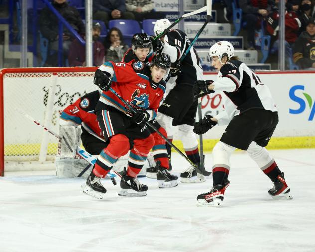 Vancouver Giants left wing Kaden Kohle (right) vs. the Kelowna Rockets