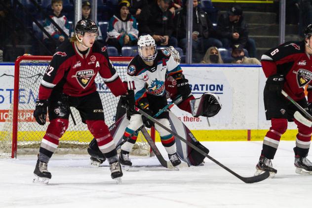 Vancouver Giants centre Craig Armstrong (left) vs. the Kelowna Rockets