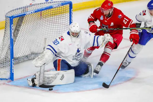 Jack Combs of the Allen Americans pursues a puck in front of the Wichita Thunder goal