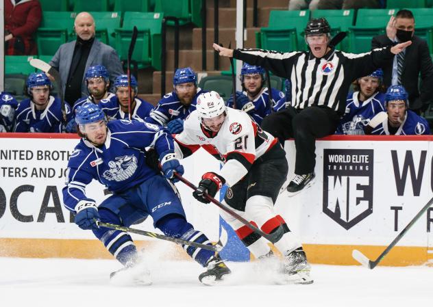 Belleville Senators defenceman Maxence Guenette (right) vs. the Syracuse Crunch