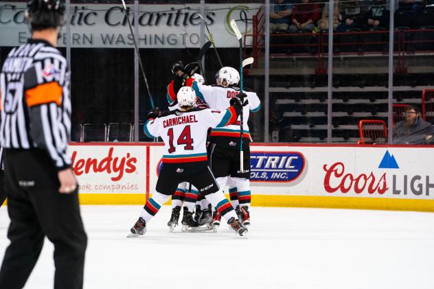 Kelowna Rockets celebrate a goal against the Spokane Chiefs