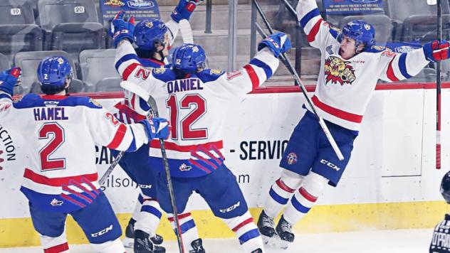Thomas Auger (right) celebrates hi overtime goal for the Moncton Wildcats