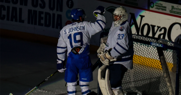 Wichita Thunder forward Stephen Johnson high fives goaltender Jake Theut
