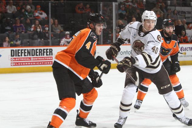 Lehigh Valley Phantoms defenseman Egor Zamula (left) vs. the Hershey Bears