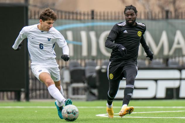 Kenardo Forbes (right) of Pittsburgh Riverhounds SC vs. Villanova University