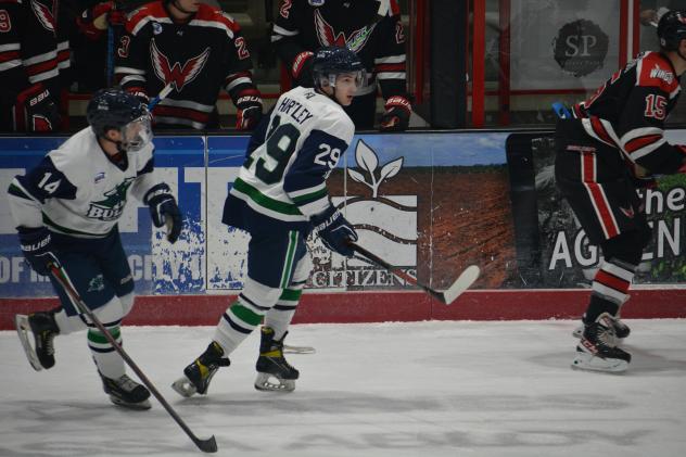 North Iowa Bulls forward Byron Hartley turns to head up the ice in a home game against the Aberdeen Wings