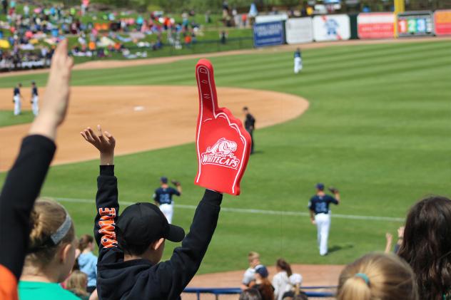 West Michigan Whitecaps fans cheer on the team