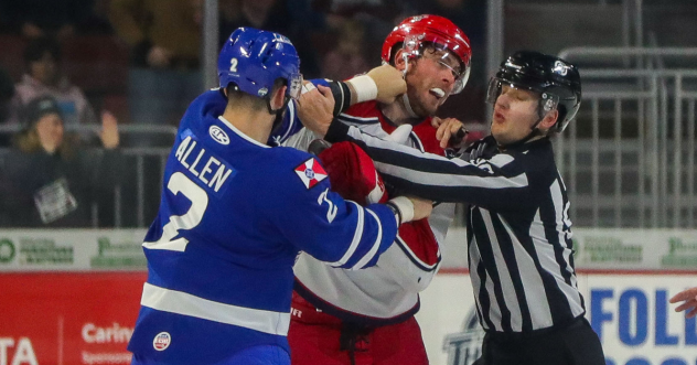 Wichita Thunder defenseman Seal Allen lands a blow against the Allen Americans