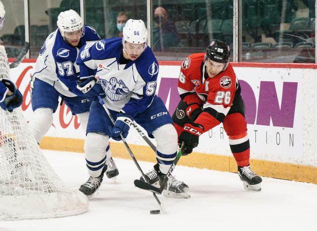 Belleville Senators left wing Andrew Agozzino (right) vs. the Syracuse Crunch