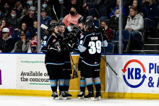 Winnipeg ICE celebrate a goal against the Lethbridge Hurricanes