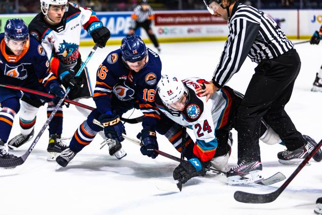 Kelowna Rockets centre Dylan Wightman (right) vs. the Kamloops Blazers