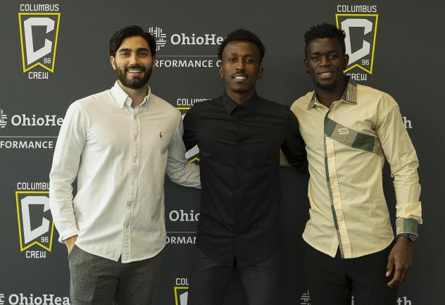 Columbus Crew 2 signees Marco Micaletto (left), Abdi Mohamed (center) and Justin Malou (right)