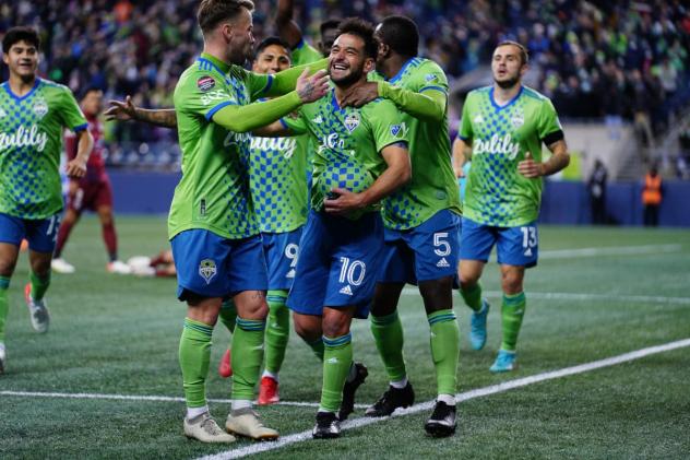 Seattle Sounders FC gather following a goal