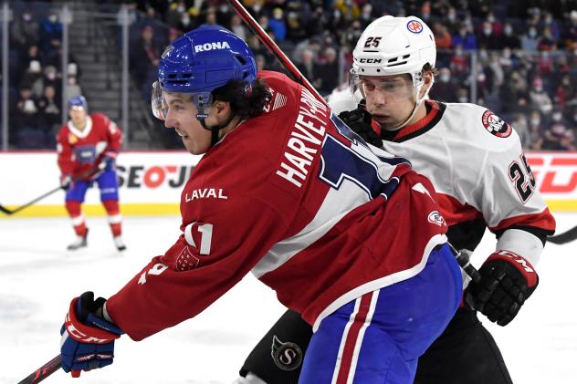 Belleville Senators defenceman Colby Williams (right) vs. the Laval Rocket