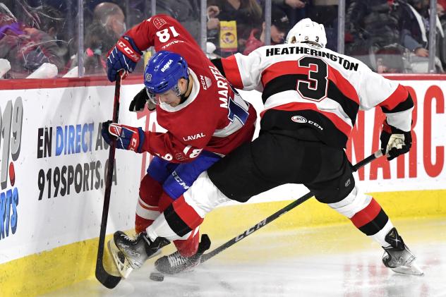 Belleville Senators defenceman Dillon Heatherington (right) vs. the Laval Rocket